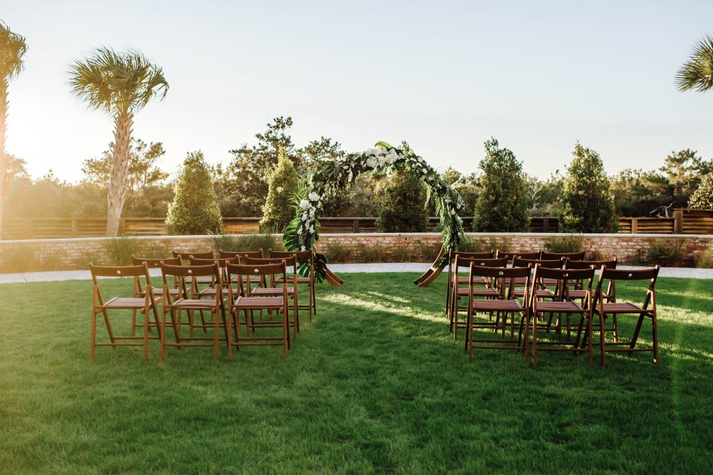 A photo of wedding ceremony setup on the grand lawn at the Henderson Beach Resort by Destin photographer Jennifer G Photography