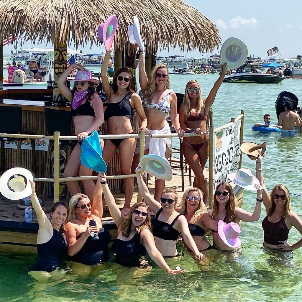 Float to Crab Island on a floating tiki bar with your girls for a bachelorette party in Destin, FL